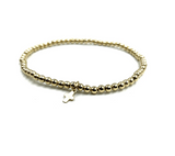 Erin gray 3MM GOLD FILLED KARMA WATERPROOF BRACELET WITH LUXE CROSS