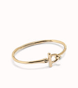 Uno de 50 Gold Bangle Bracelet with white topaz